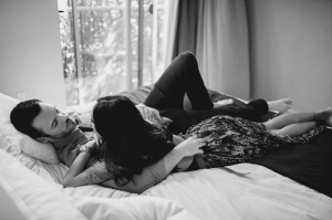 couples-cuddling-in-bed-black-and-white-xnlxlflp